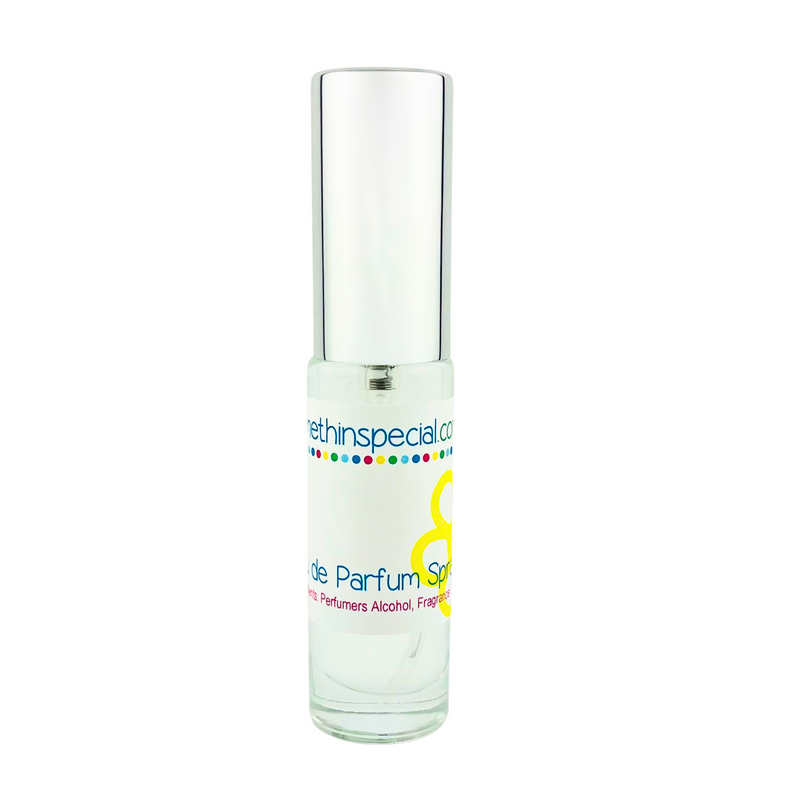 Small glass bottle with black cap on a white background